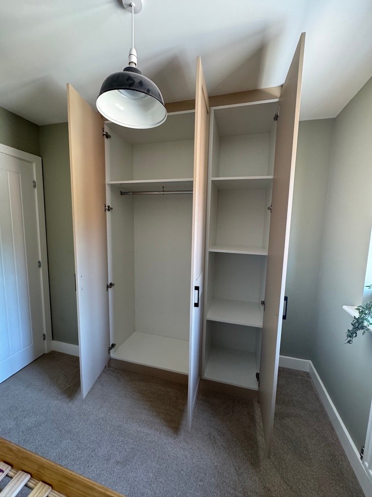 Inside bespoke wardrobe